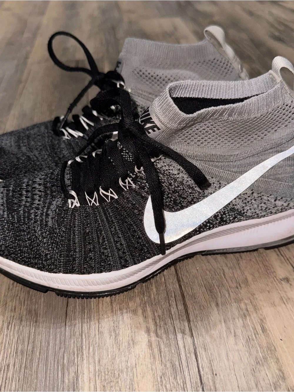 Nike Kids Black and Gray Flyknit High-Top Sneakers with White Swoosh
